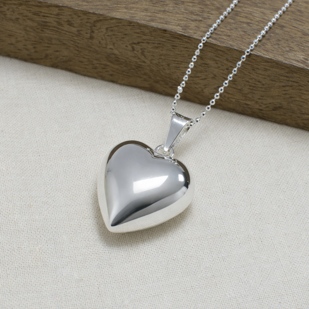 Silver Plated Chiming Heart Pendant Necklace