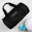 Monogrammed Barrel Gym Bag in Black - treat-republic